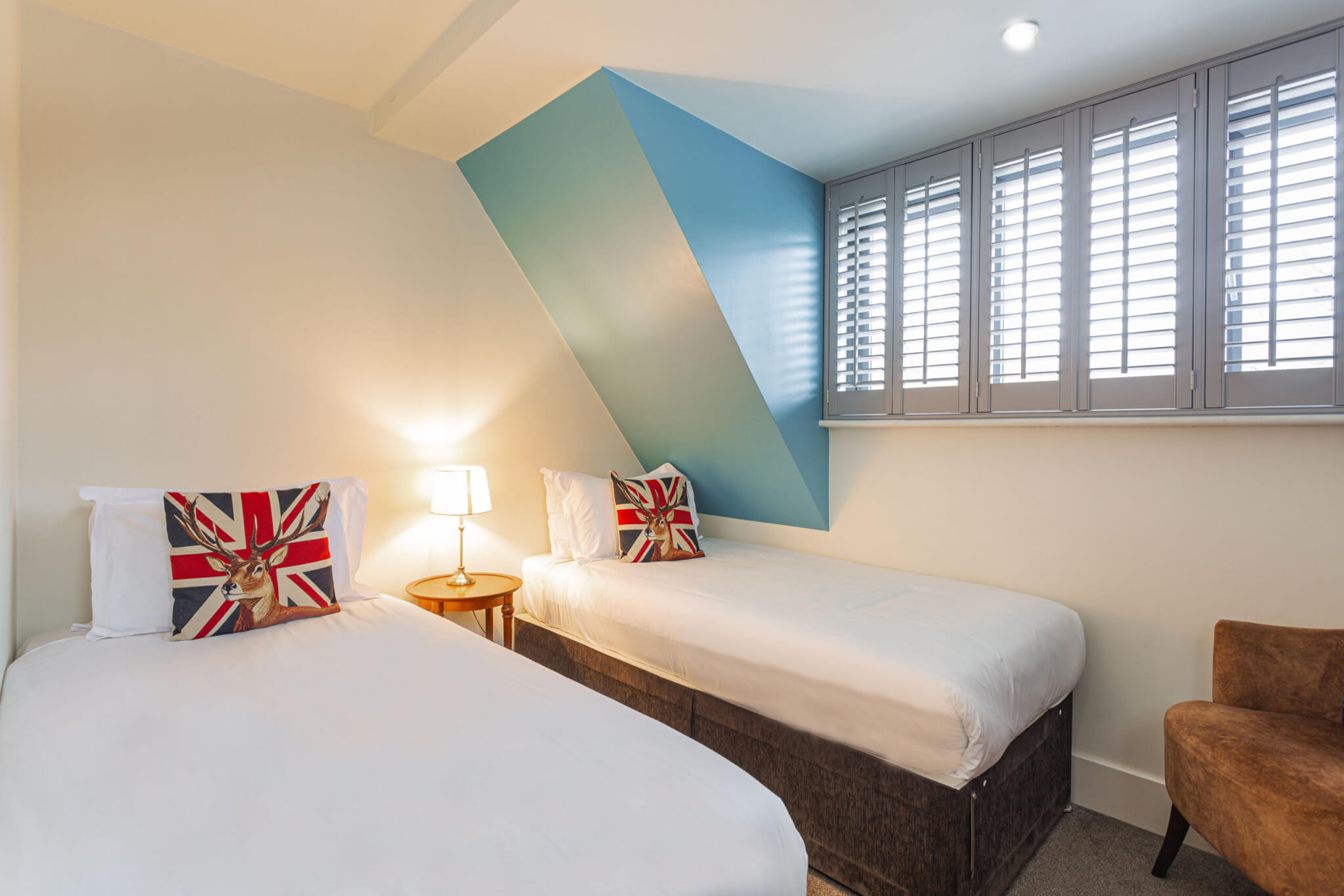 Forest Park Hotel Deluxe Family Quad Room Beds scaled